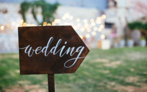 A sign that says "Wedding."