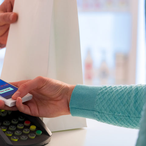 Paying for donuts using cell phone Mobile Wallet