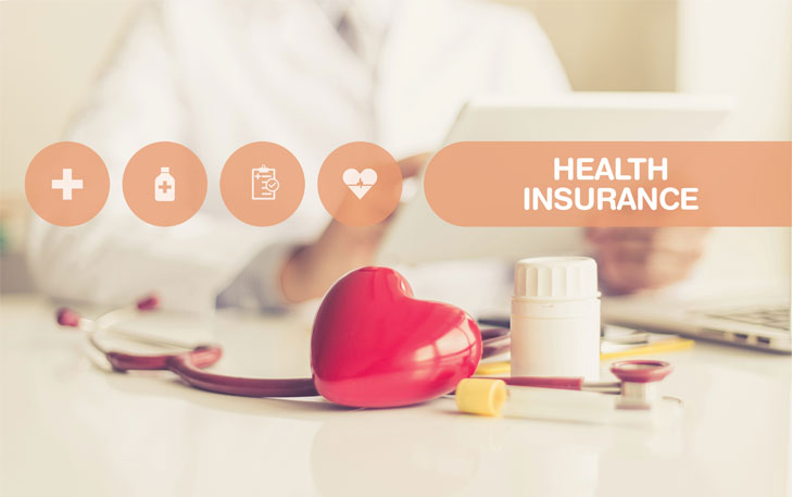 Person sitting down with a medicine bottle and squeezable heart in front of the words Health Insurance