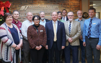 Credit union representatives with Jim Hagedorn