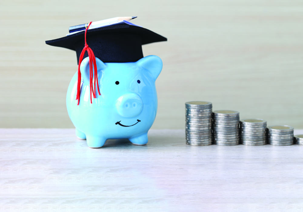 Piggy Bank with pencil and coin_SouthPoint