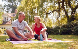 Retired Couple doing Yoga to relax