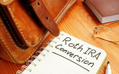 Notebook with the words Roth IRA Conversion