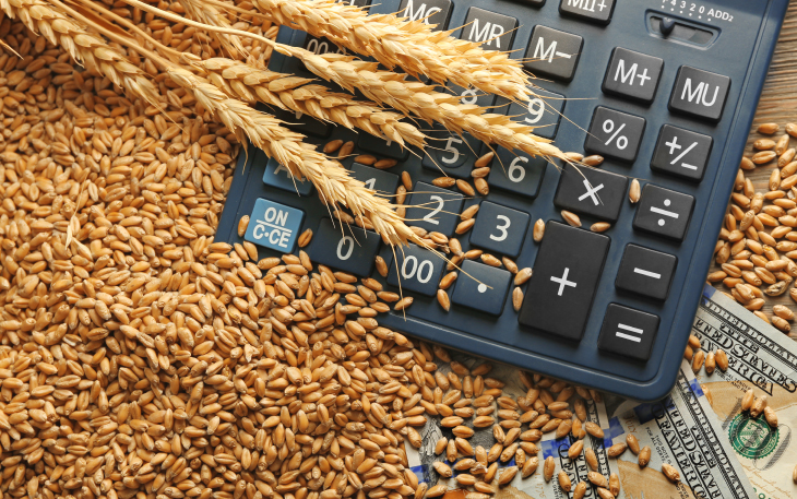 Wheat, a calculator and money is shown.