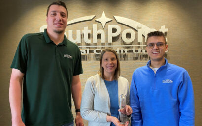 SouthPoint's Marketing Department from left to right: Max Grabow, Kim Peterson, and Jeff Hogen holding a 2023 CUNA Diamond Award